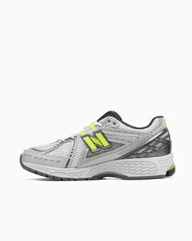 New Balance 1906 en Gris con Fluor